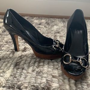 Black Gucci Peeptoe Pumps with platform
